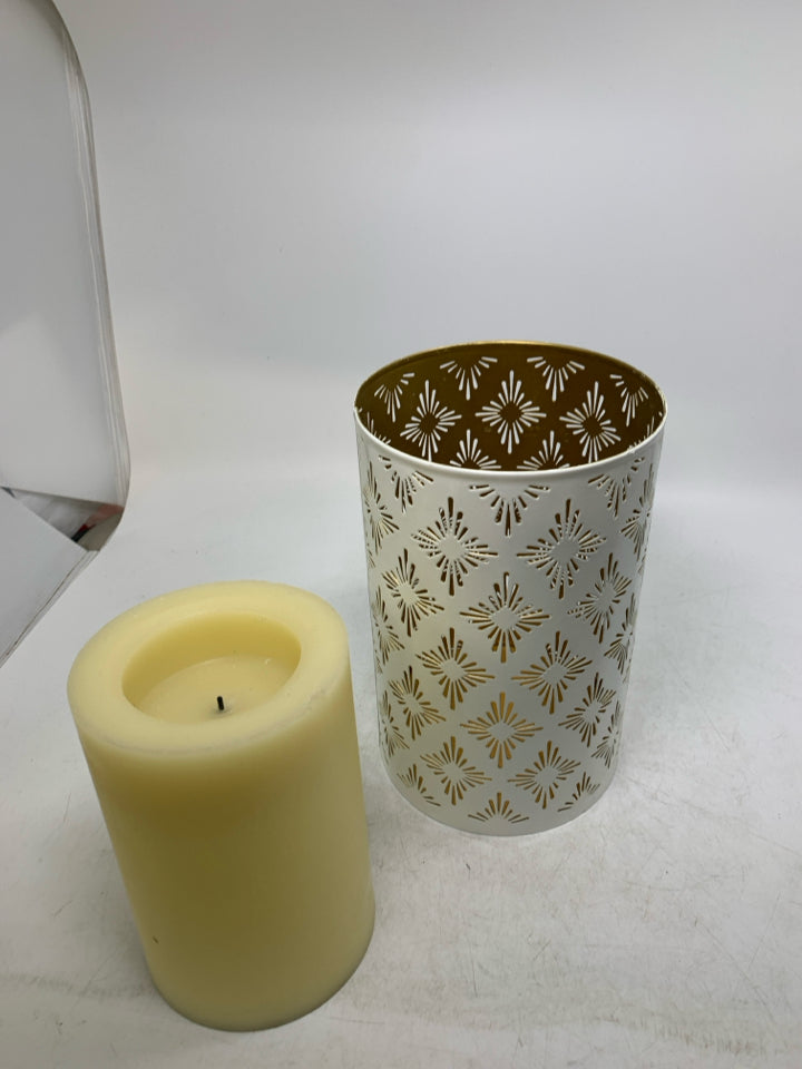 PIERCED METAL CYLINDER CANDLE HOLDER W/ FAUX PILLAR CANDLE.