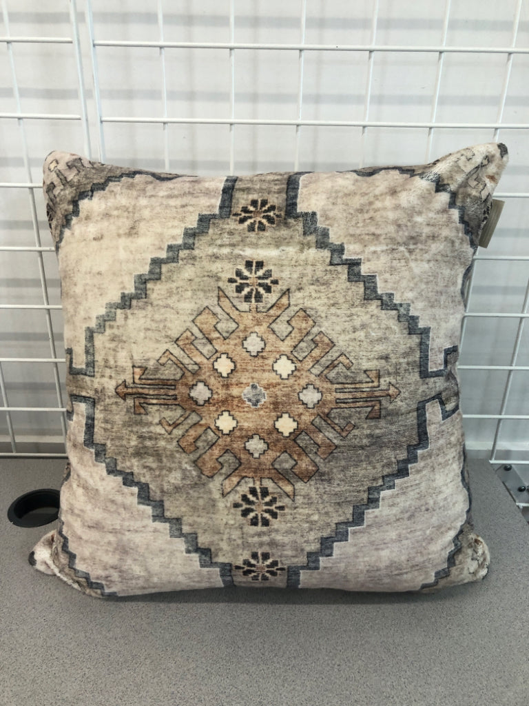 FUZZY GEOMETRIC PILLOW.