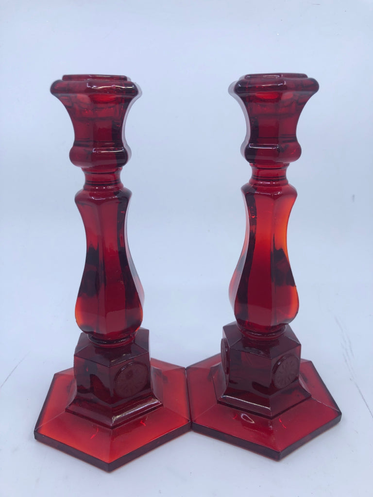 2 RED GLASS TAPER CANDLE HOLDERS.