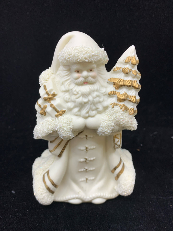 CERAMIC CREAM AND GOLD STANDING SANTA.