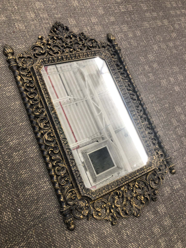 SCROLL METAL DISTRESSED FRAME MIRROR.