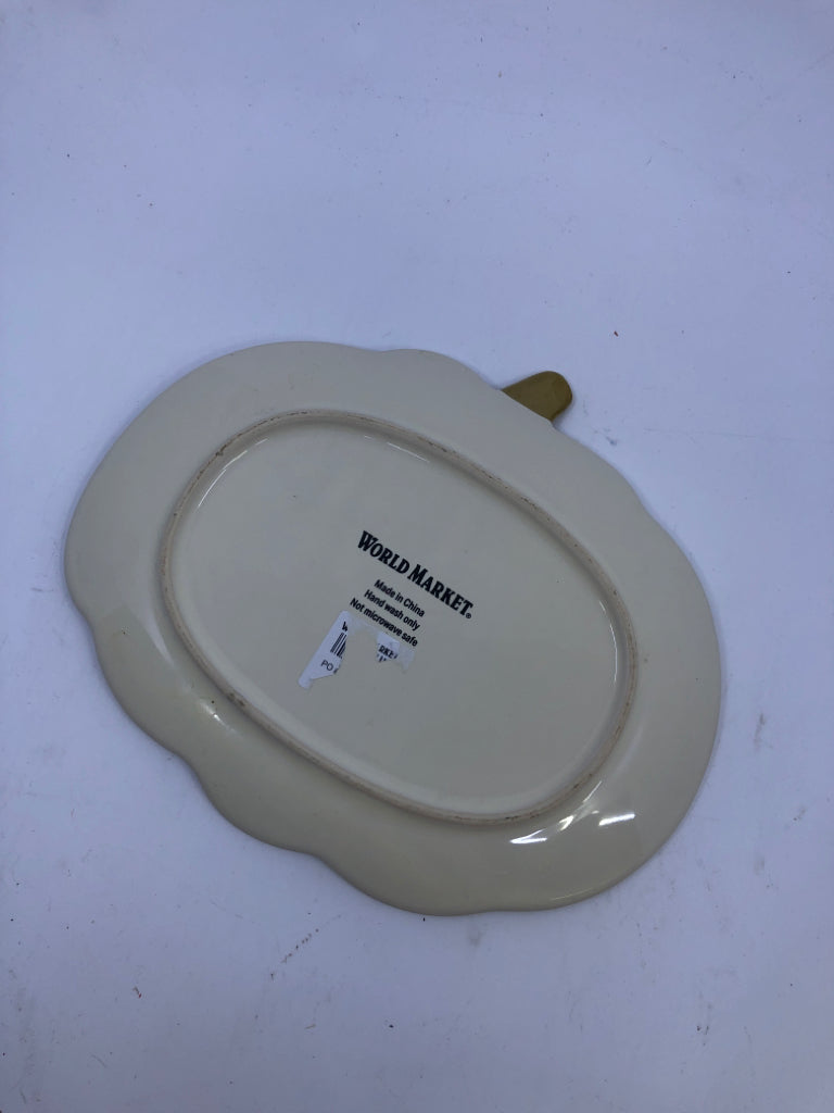 CREAM CERAMIC PUMPKIN DISH W/GOLD PAINTED STEM.