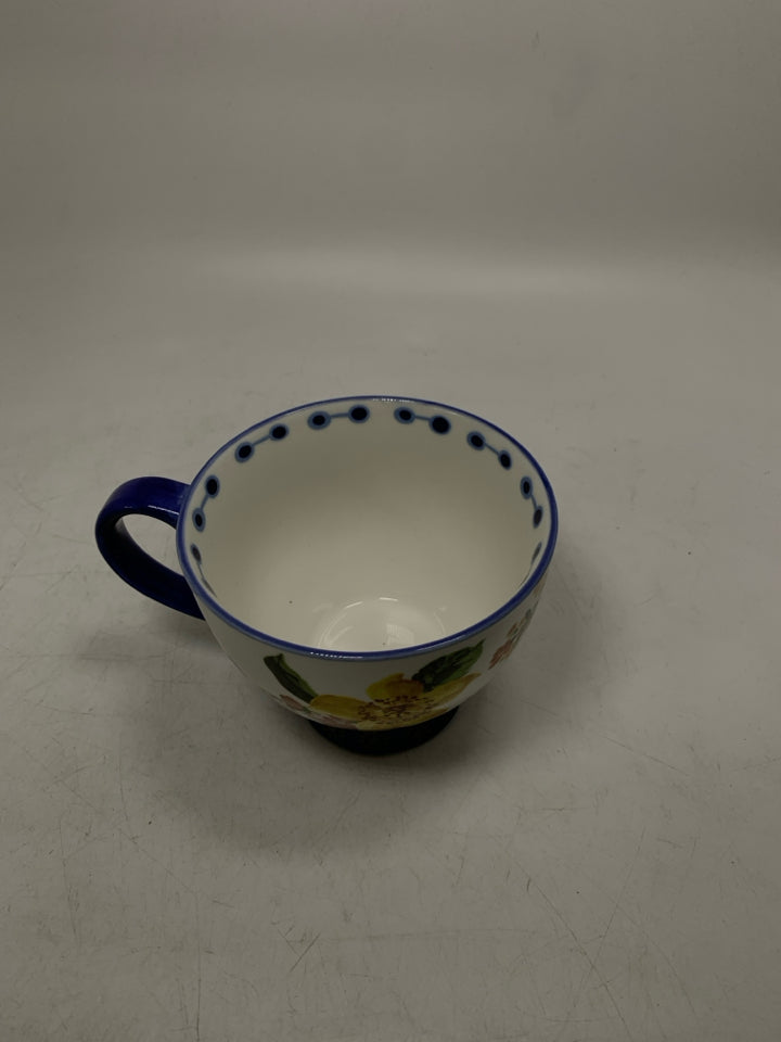 FOOTED FLORAL MONOGRAM E MUG.
