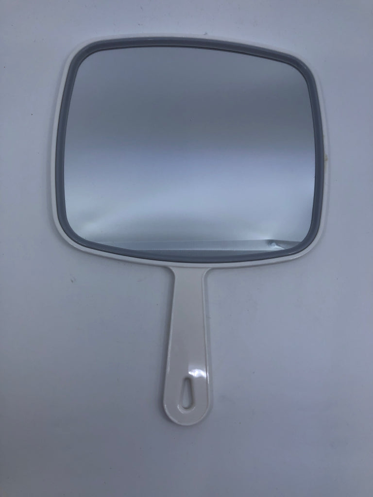WHITE HANDHELD MIRROR.