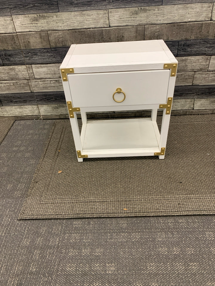 WHITE LOW TWO TIER SIDE TABLE W/ GOLD HARDWARE CIRCLE HANDLES.