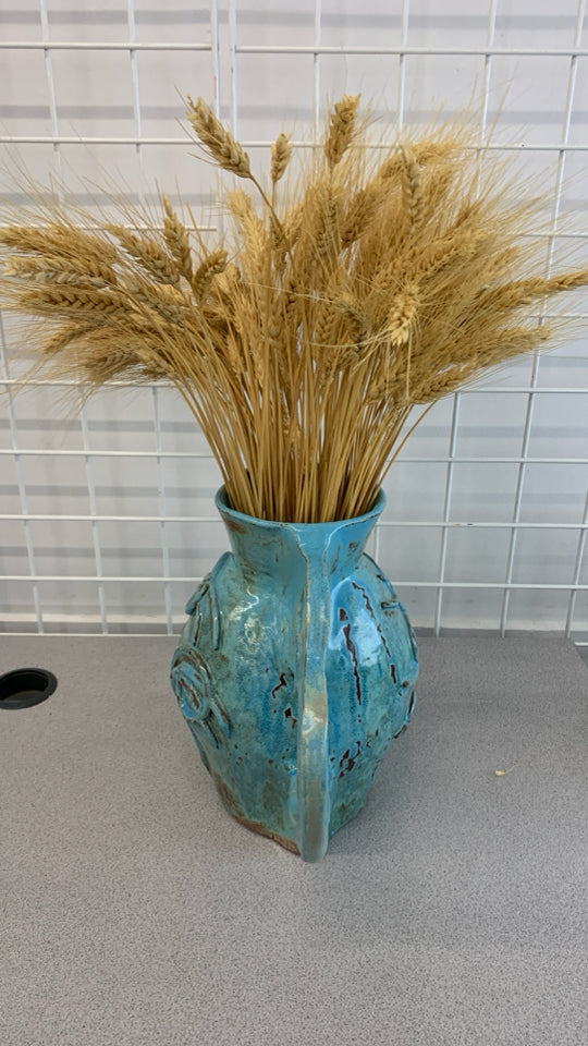 BLUE GLAZED POTTERY PITCHER W/WHEAT DECOR.