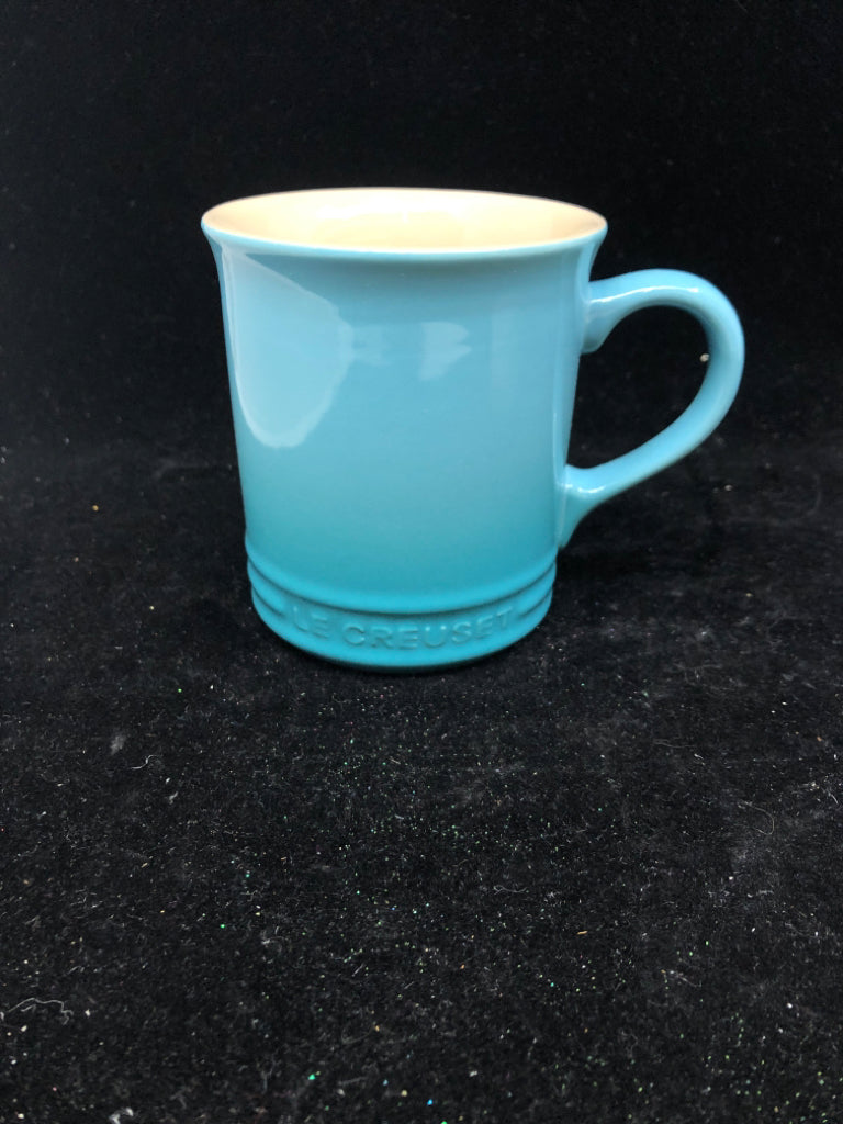 AQUA LE CREUSET MUG.