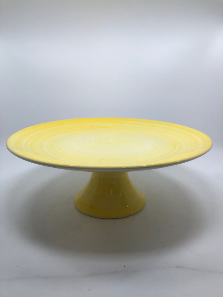 RAISED YELLOW CAKE STAND.