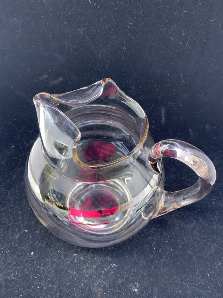 ROUND BULB PITCHER W SILVER RIM.