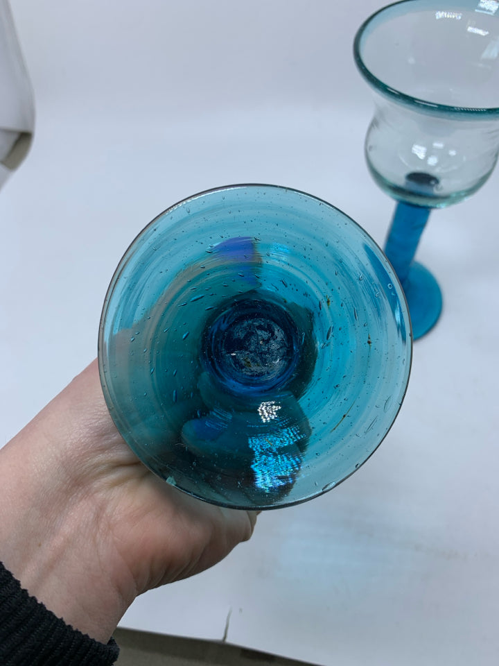 2 HAND BLOWN BLOWN BLUE STEM WINE GLASSES.