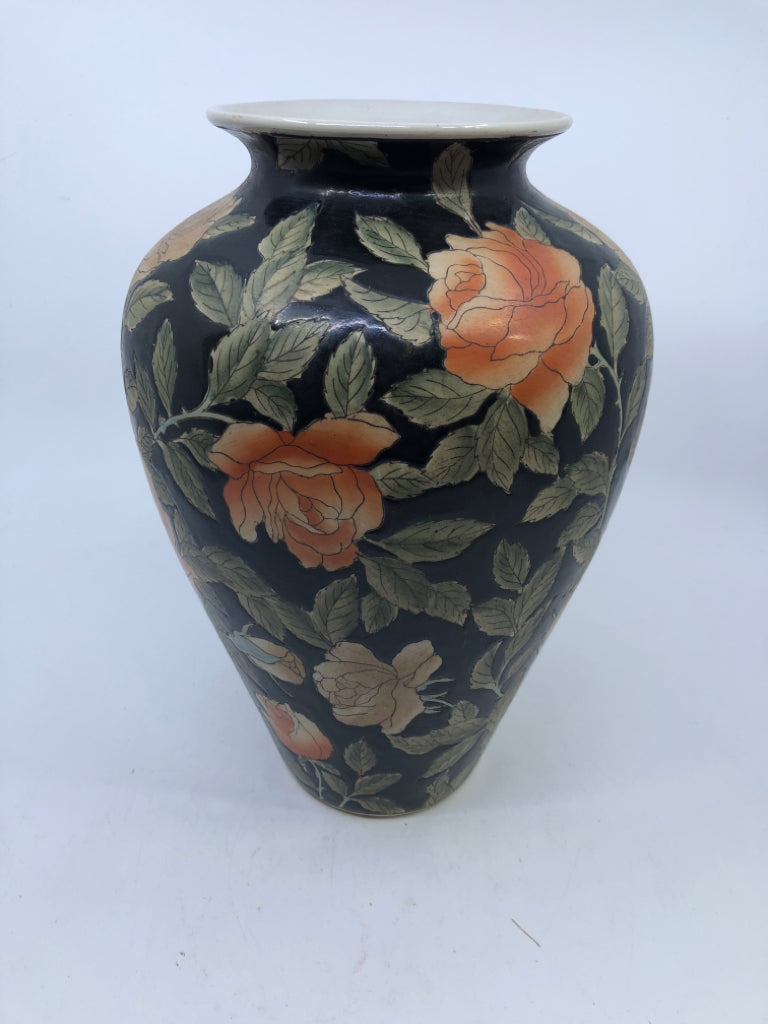 BLACK CERAMIC VASE W/ORANGE FLOWERS.