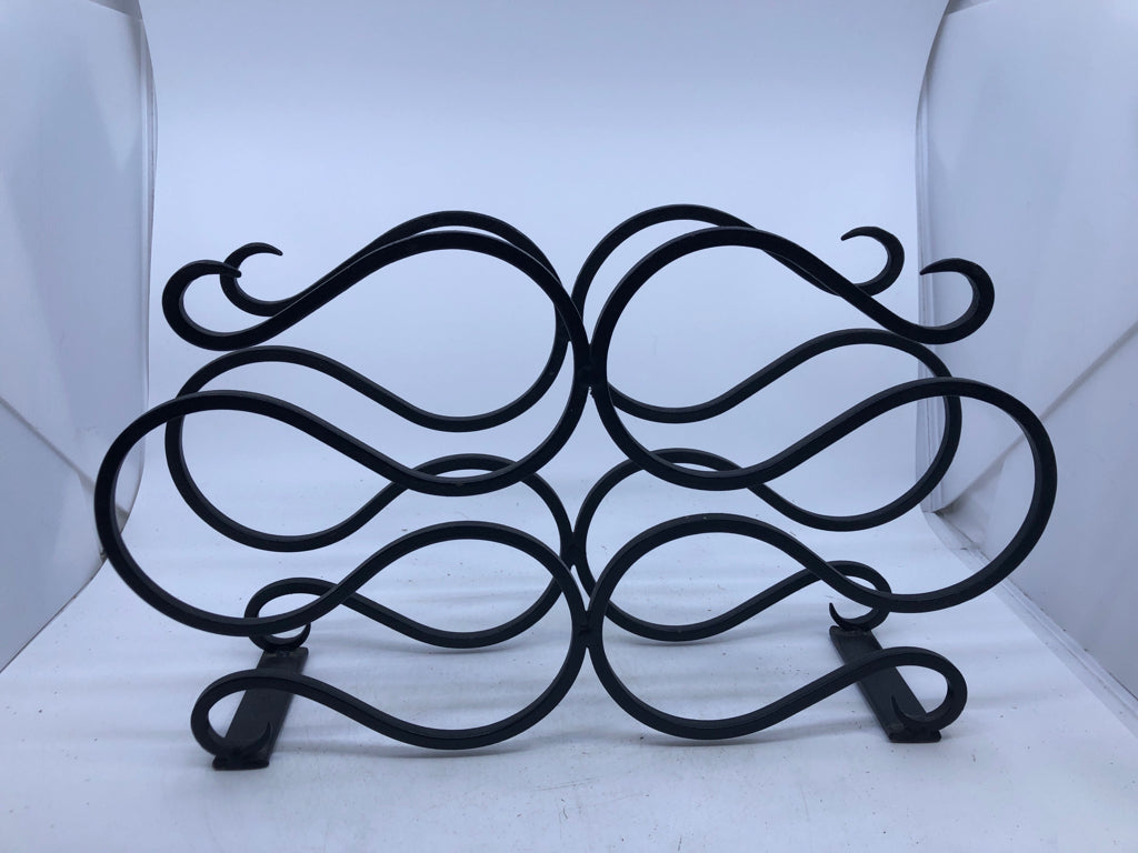 BLACK WROUGHT IRON WINE RACK.