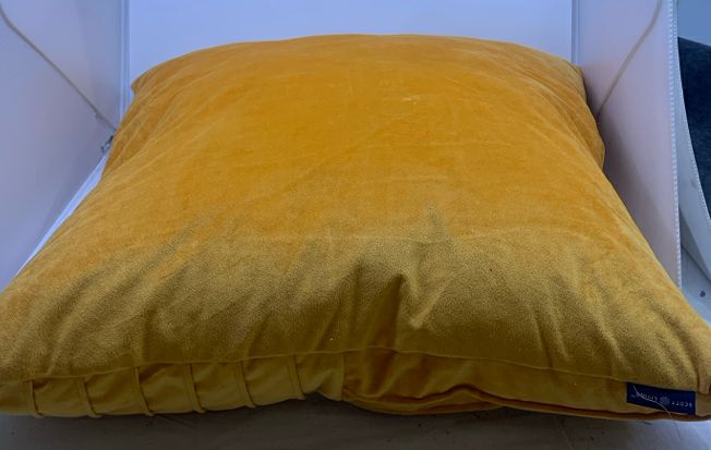 LARGE ORANGE PILLOW.