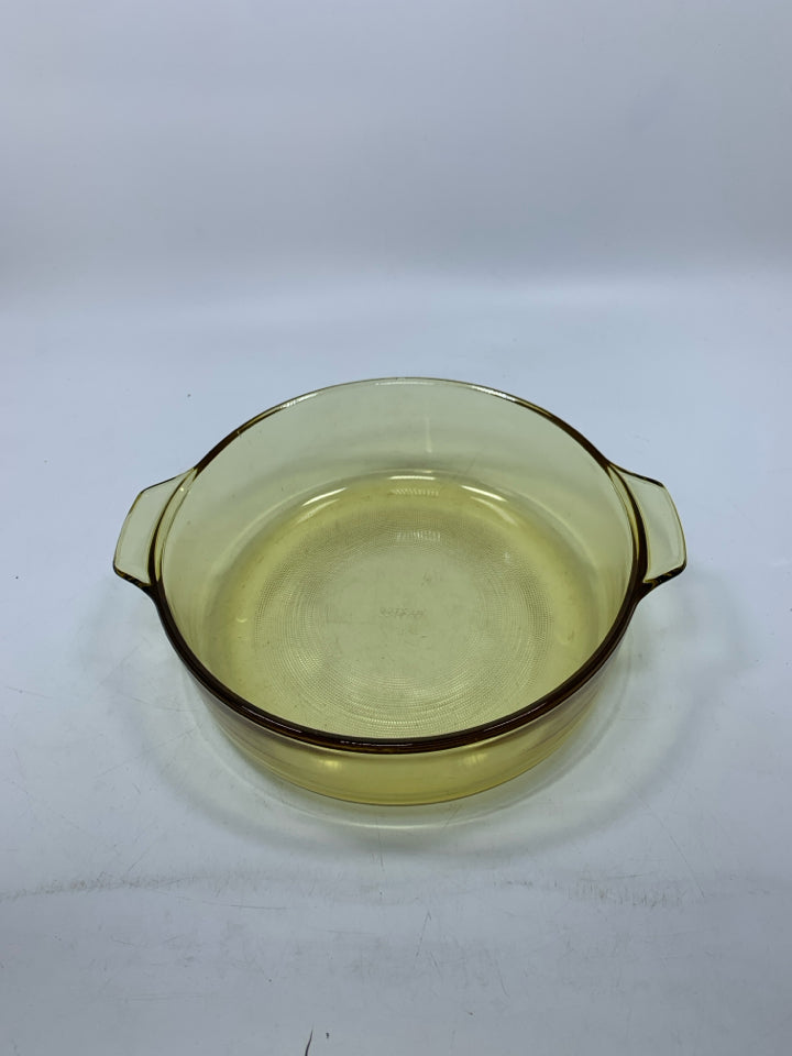 VTG DYNAWARE YELLOW GLASS CIRCLE BAKING DISH W/ HANDLES.