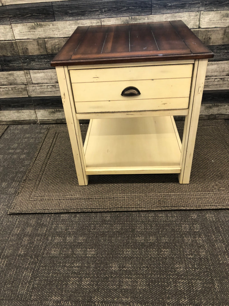 CREAM AND DARK WOOD TOP DISTRESSED END TABLE W 1 DRAWER.