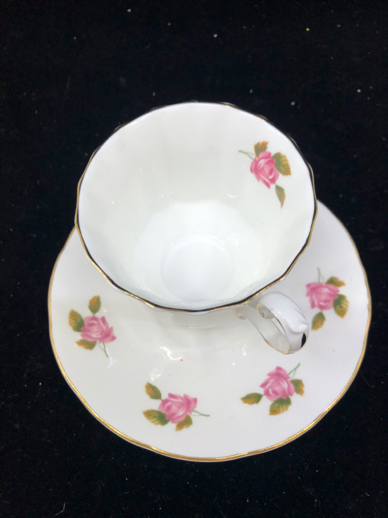 PINK FLORAL TEACUP AND SAUCER.
