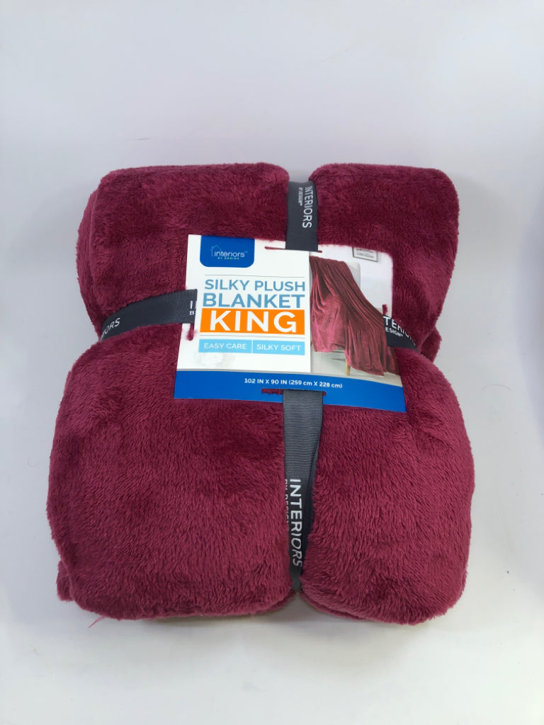 NIP RED PLUSH KING SIZE BLANKET.