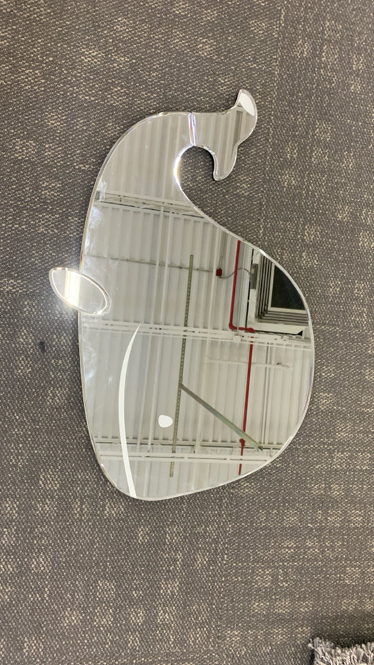 LARGE WHALE SHAPED MIRROR.