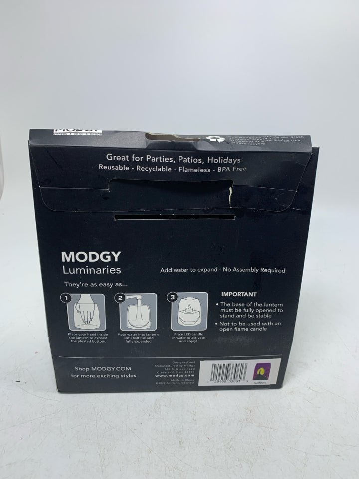 NIP LUMINARY LANTERNS FLAMELESS FLOATING LED CANDLES.