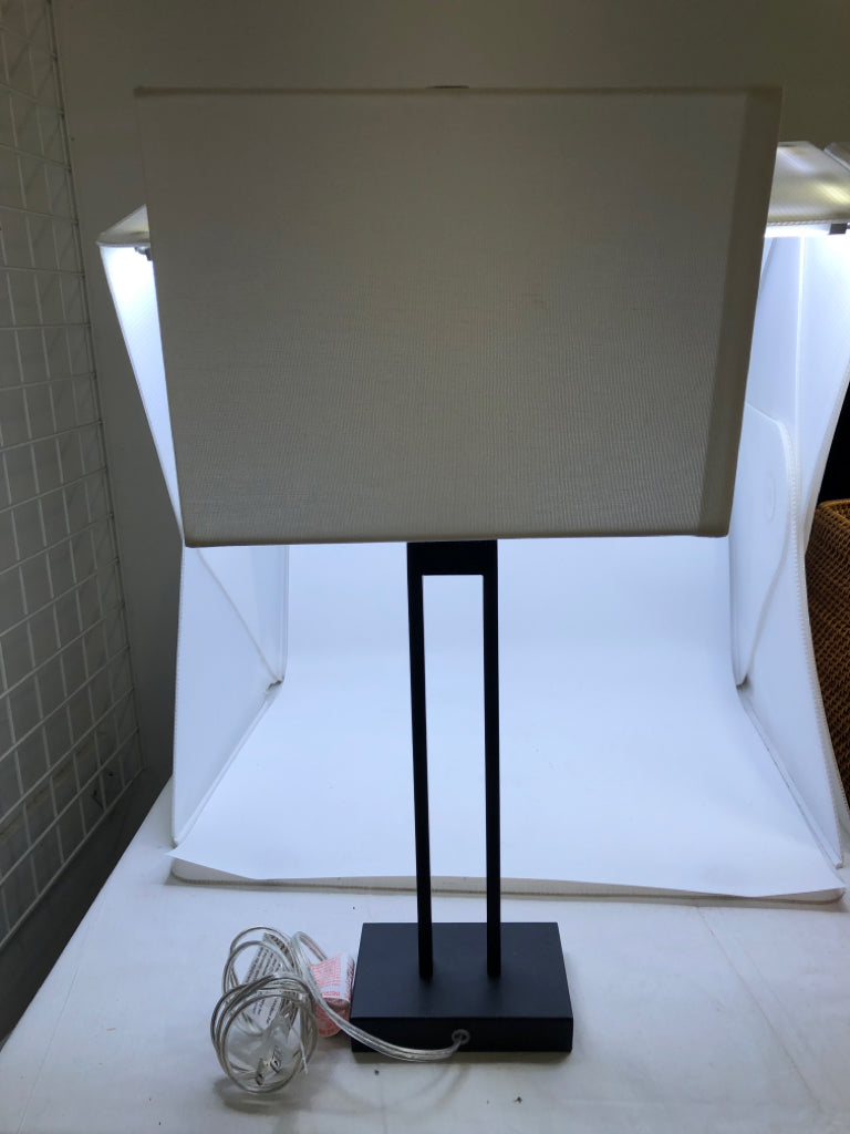 BLACK SQUARE AND WHITE SHADE LAMP.