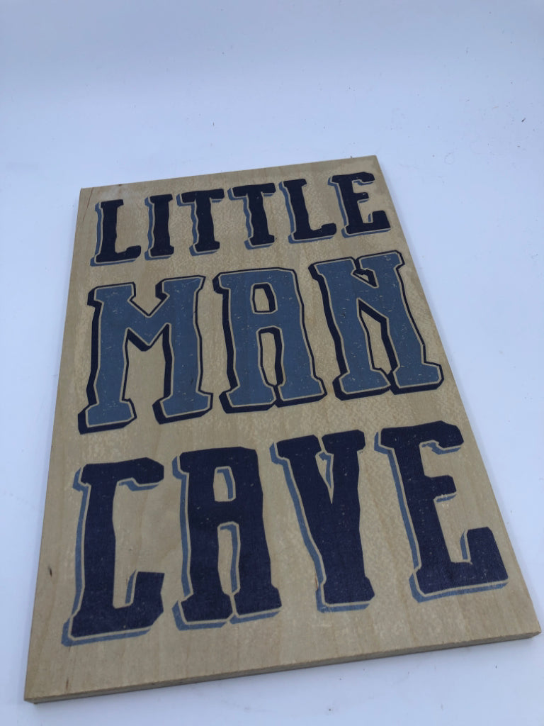 LITTLE MAN CAVE WALL ART.
