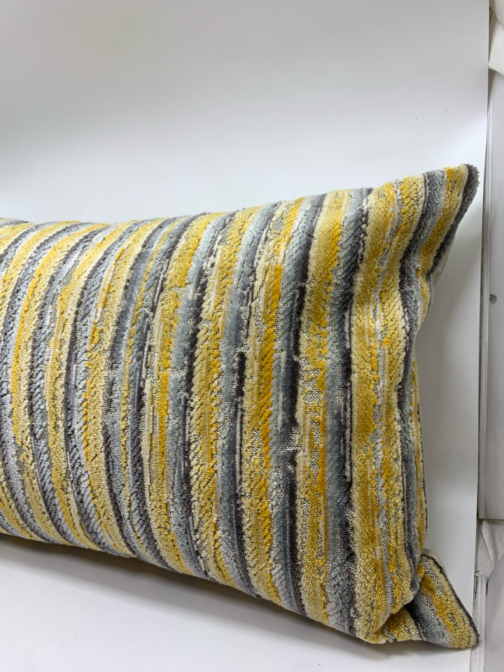BLUE/YELLOW PATTERNED THROW PILLOW.