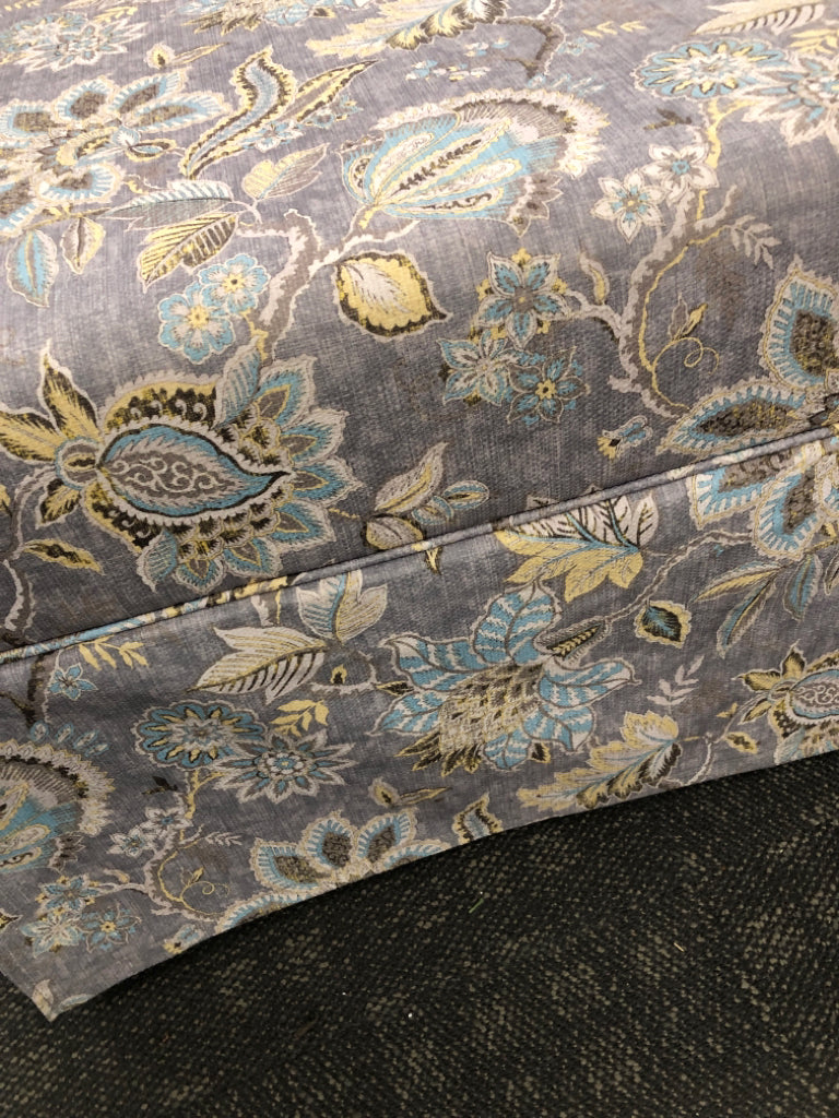 GREY FLORAL UPHOLSTERED OTTOMAN.