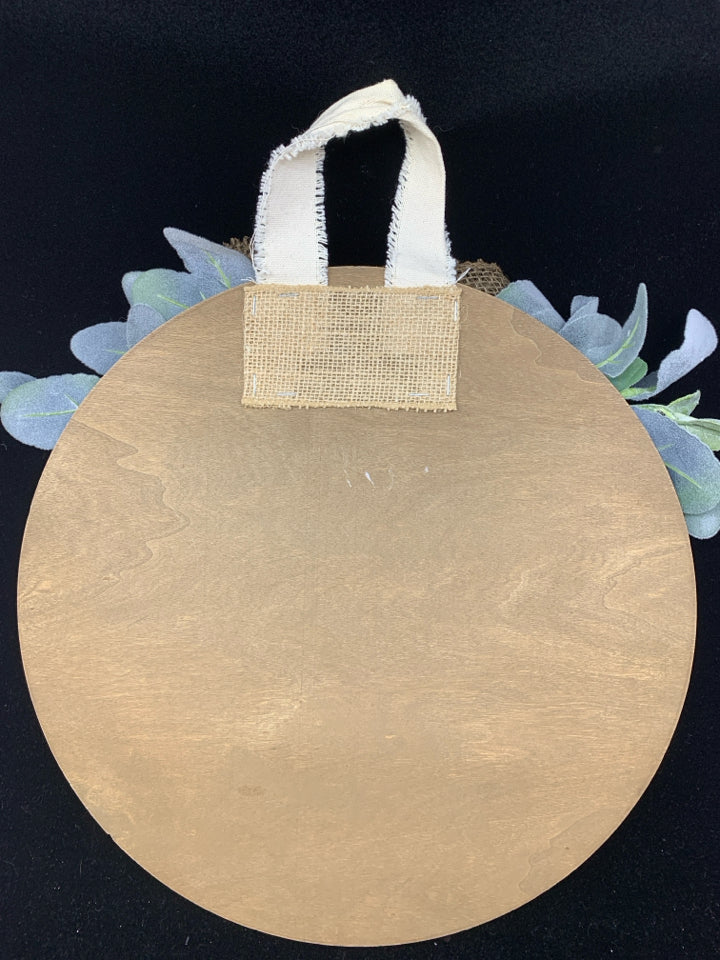 ROUND "WE DON'T HAVE A WELCOME MAT" DOOR HANGING.