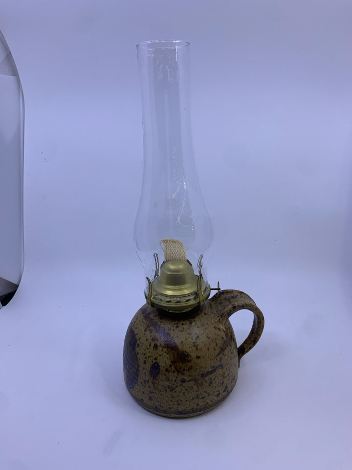 TAN W/ BROWN SPECKLES POTTERY BASE OIL LAMP W/ GLASS SHADE.