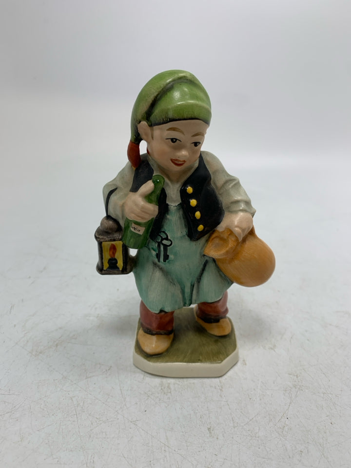 VTG FRIEDEL GERMAN MAN HOLDING BOTTLE & LANTERN FIGURINE.