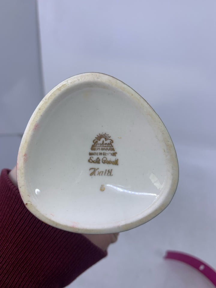 COBALT BLUE TRIANGLE SHAPED VASE W/ LEAF/STEMS FLOWERS.