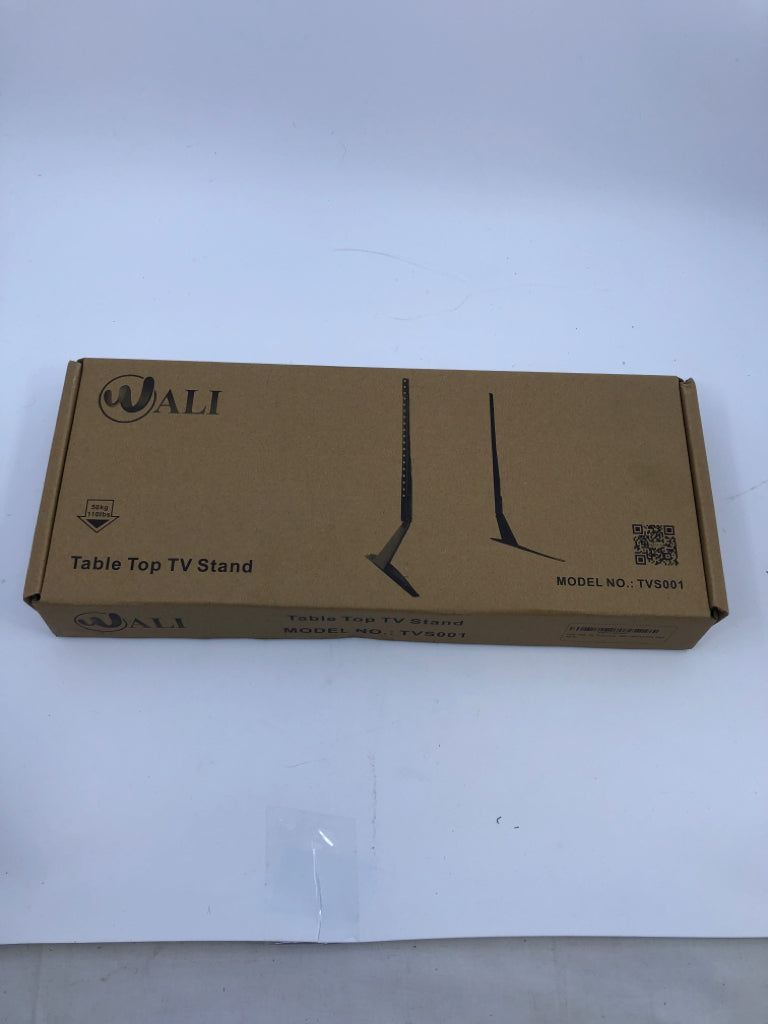 NIB TABLE TOP TV STAND.