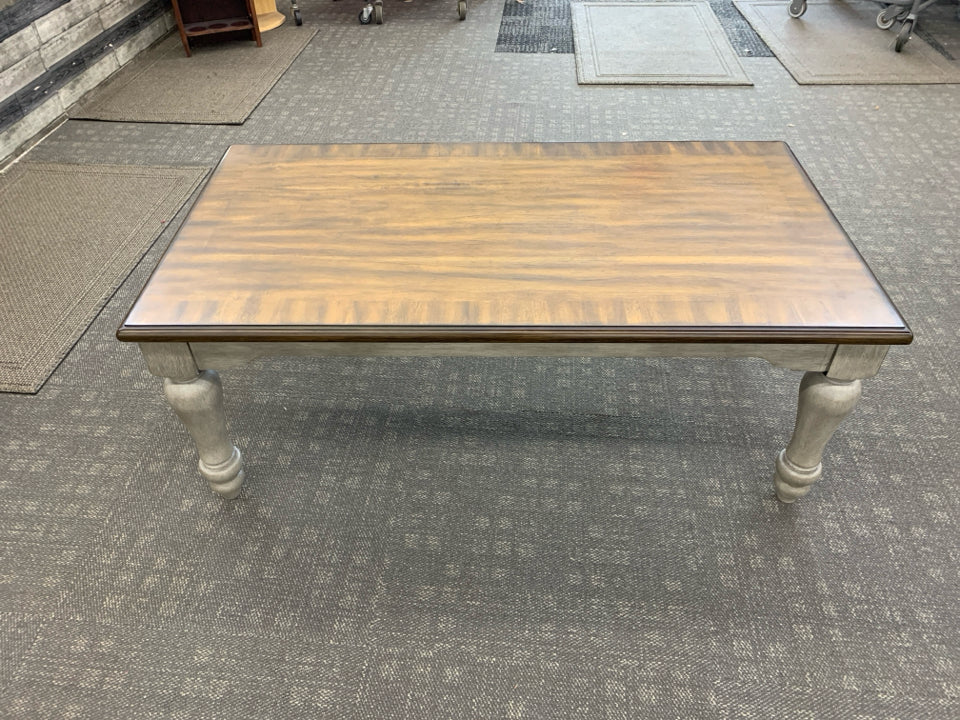DARK WOOD TOP W GREY DISTRESSED LEGS COFFEE TABLE.