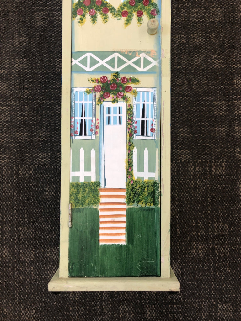 TALL WOODEN HOUSE BOOKSHELF W/PAINTED FLORALS.