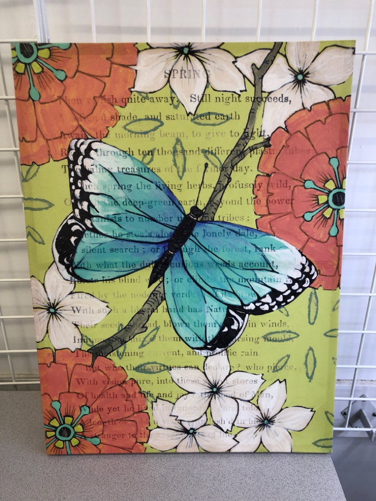 TEAL BUTTERFLY CANVAS ON GREEN BACKGROUND, RED FLOWERS.