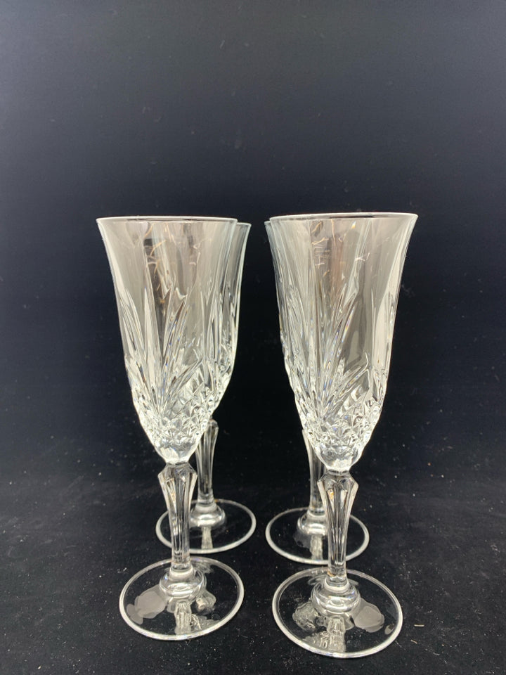 4 CUT GLASS CHAMPAGNE FLUTES.