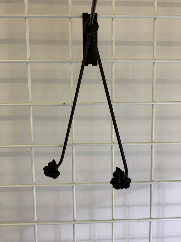 2 BLACK IRON HANGING PLATE HOLDERS W/ LEAVES.