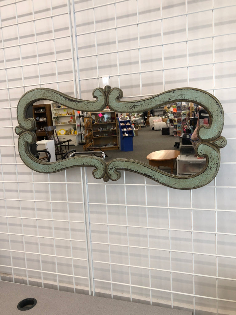 TEAL DISTRESSED SCROLL WALL MIRROR.