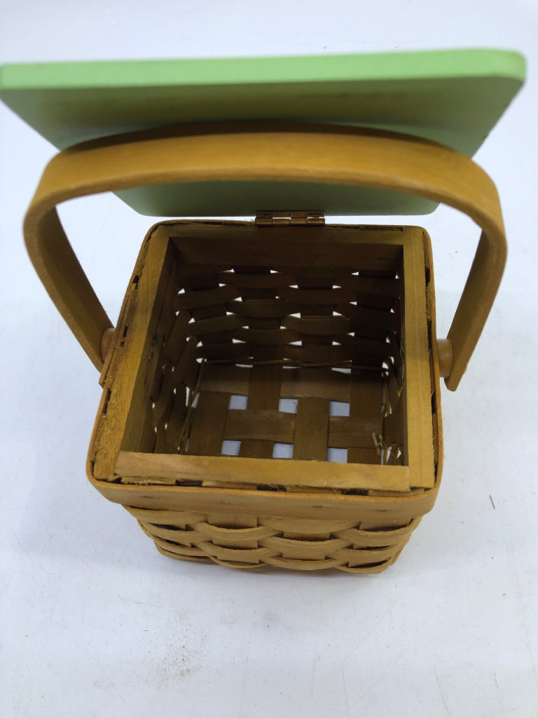 "MERRY AND MAGICAL" BASKET WITH LID AND HANDLE.