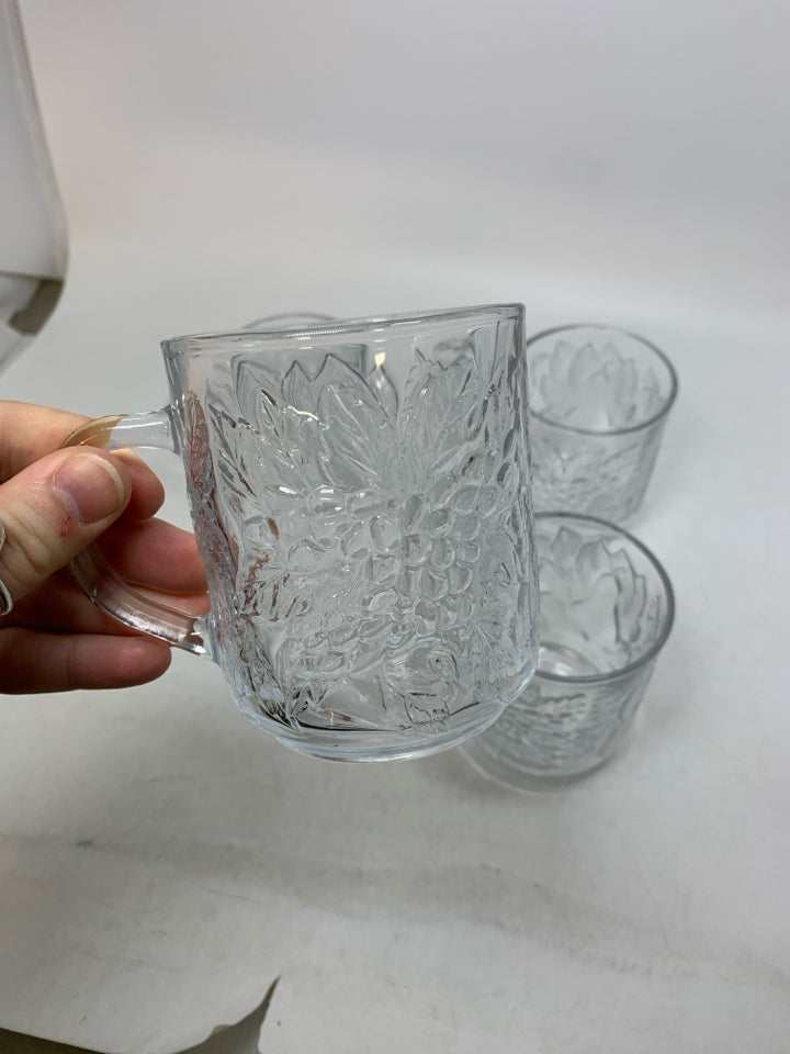 4 EMBOSSED ASSORTED FRUIT MUGS.