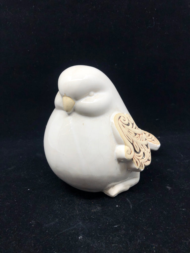 CREAM BIRD W DETAILED WINGS.