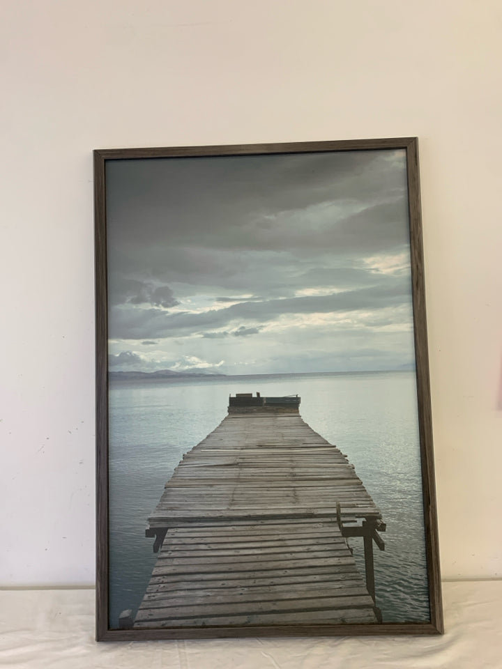 OLD DOCK PIER PRINT IN A GREY FRAME.