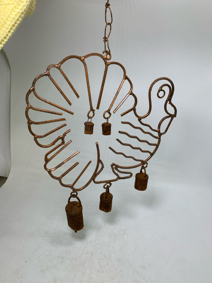 METAL TURKEY OUTLINE W/ RUSTED BELLS WALL HANGING.
