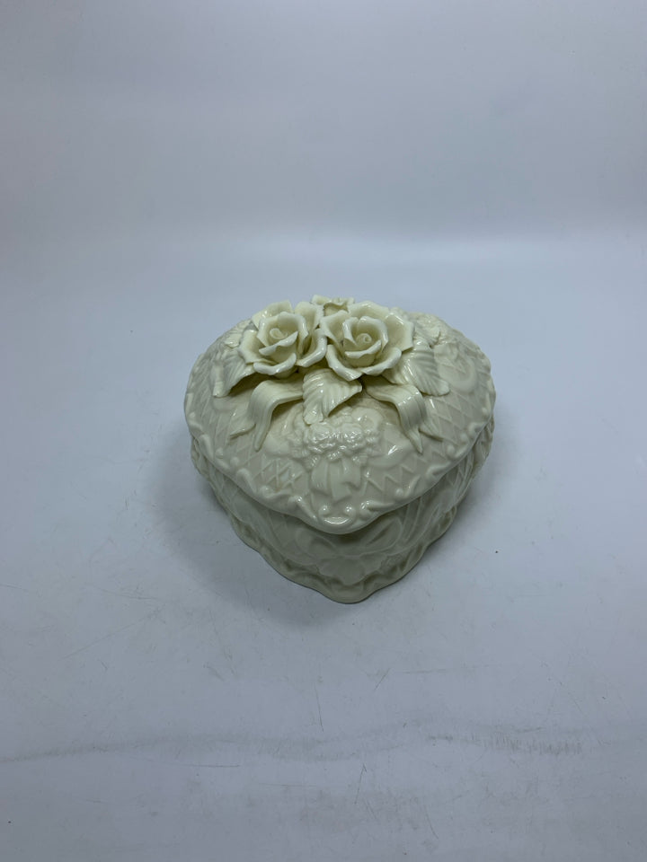 CERAMIC HEART SHAPED CANISTER W/ EMBOSSED ROSES & RIBBON.