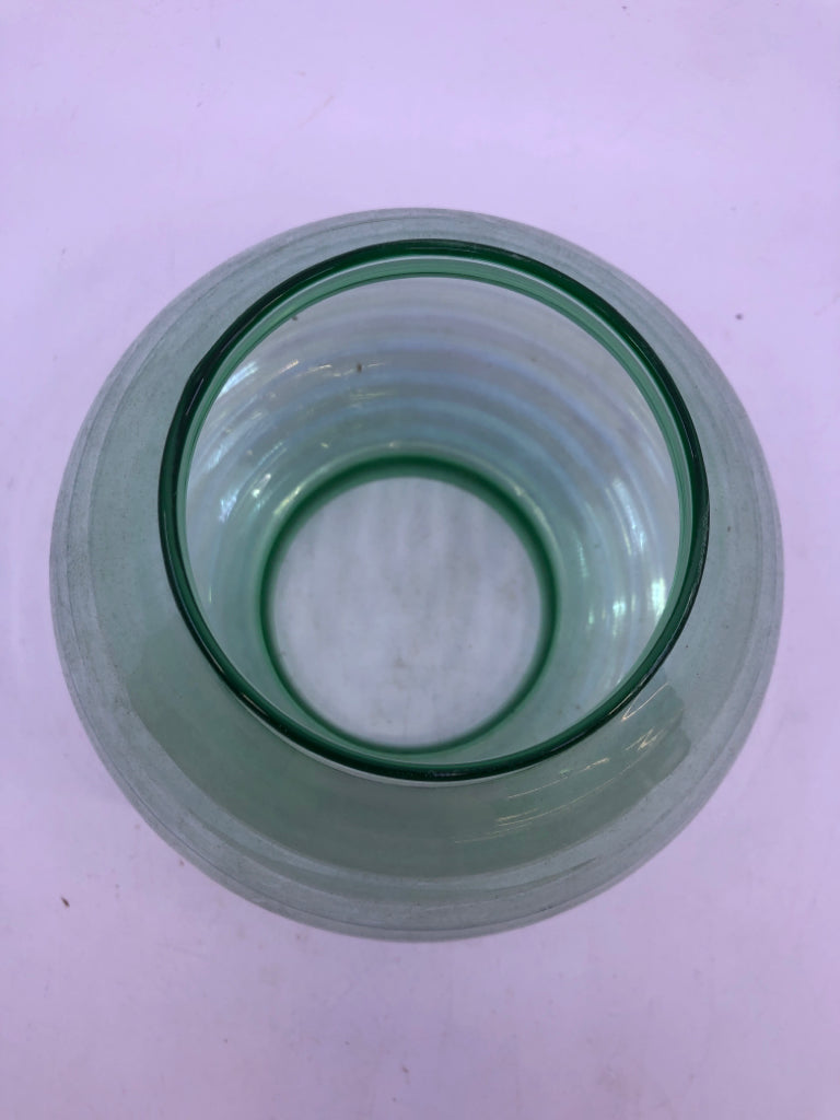 PEWTER BASE TAPERED CANDLE HOLDER W/ GREEN IRIDESCENT GLASS SHADE.