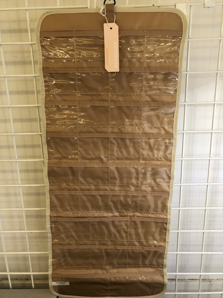 NEW FABRIC CREAM TRAVEL JEWELRY HOLDER.