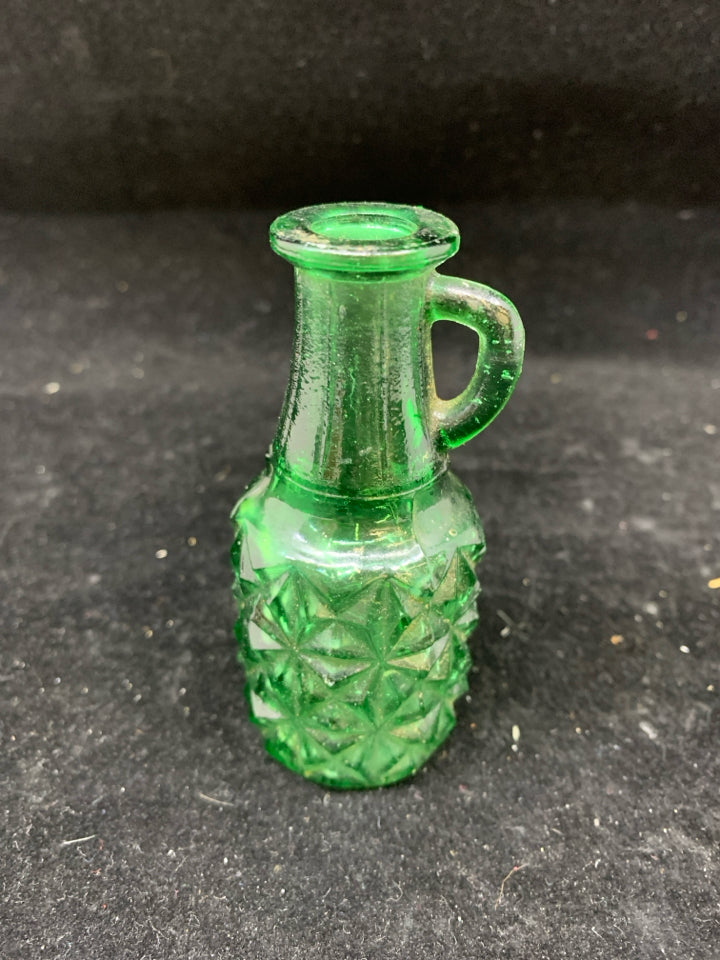 GREEN TEXTURED GLASS EMPTY BOTTLE W HANDLE.