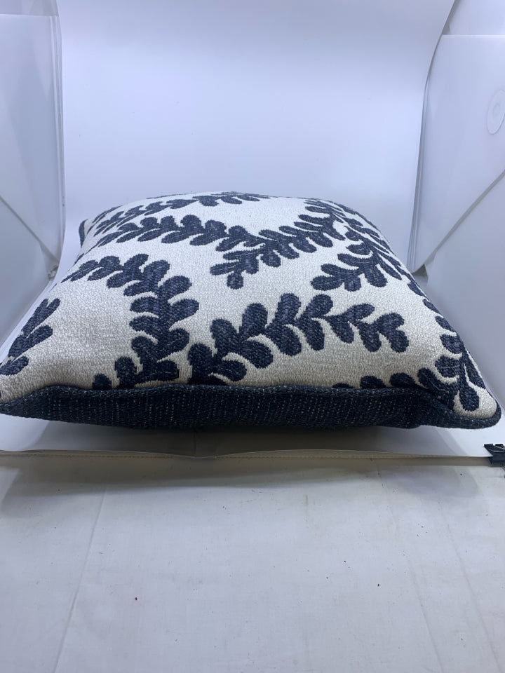NAVY LEAF DETAIL, WHITE AND NAVY PILLOW.