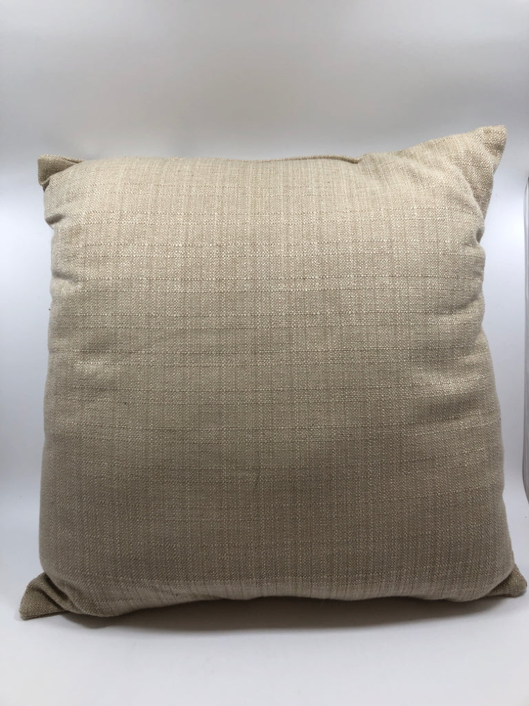 BEIGE TEXTURED THROW PILLOW W/BROWN BUTTON.