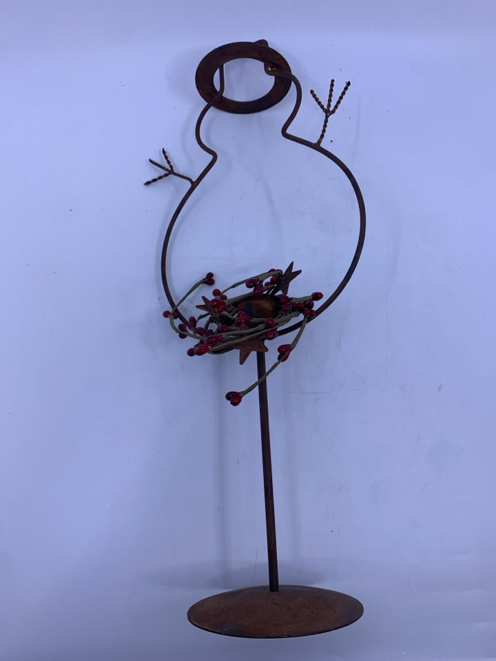 PRIMITIVE METAL SNOWMAN TAPER CANDLE HOLDER.